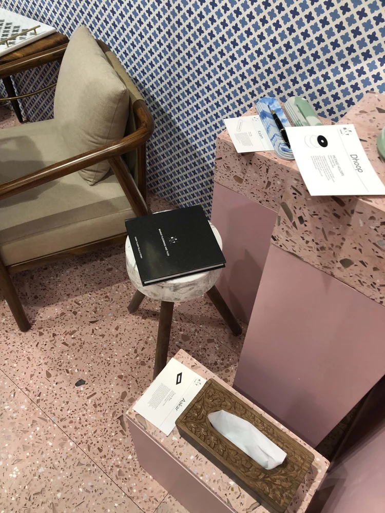 BFT Home interior display with terrazzo flooring and product arrangement