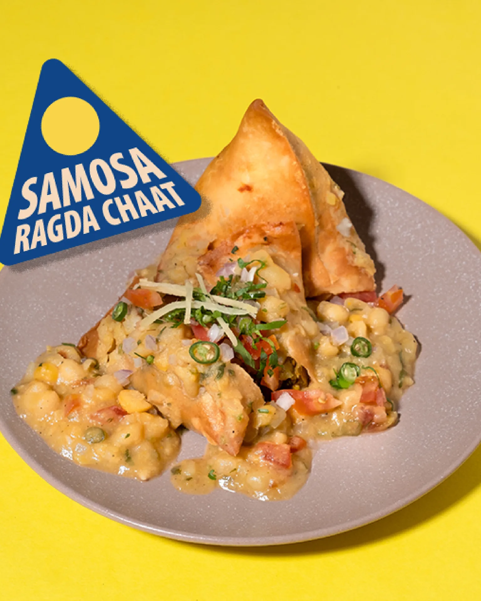 CHAATERY - Samosa Ragda Chaat dish with crispy samosa and chickpea curry