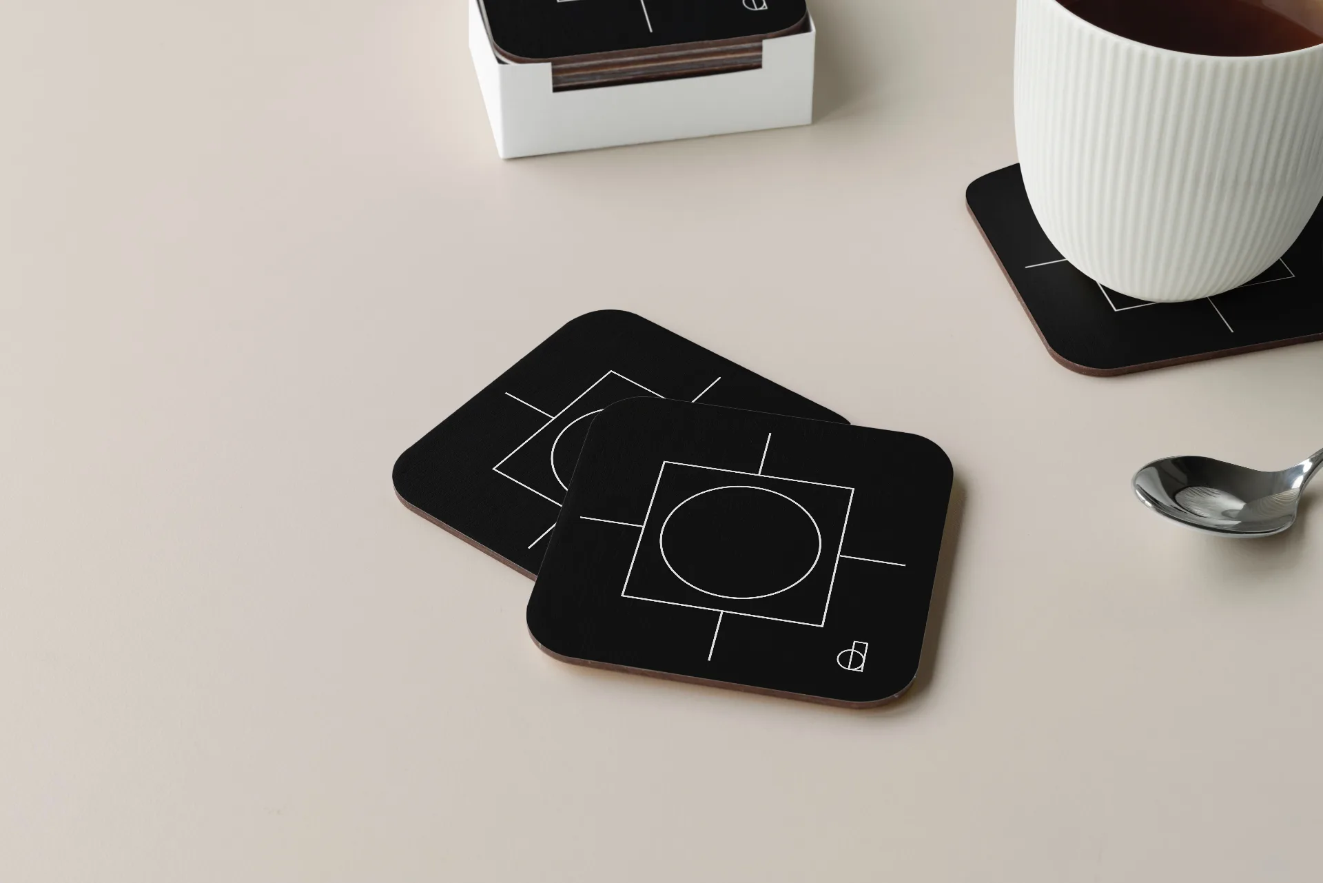 District 150 - Branded coasters with geometric pattern design