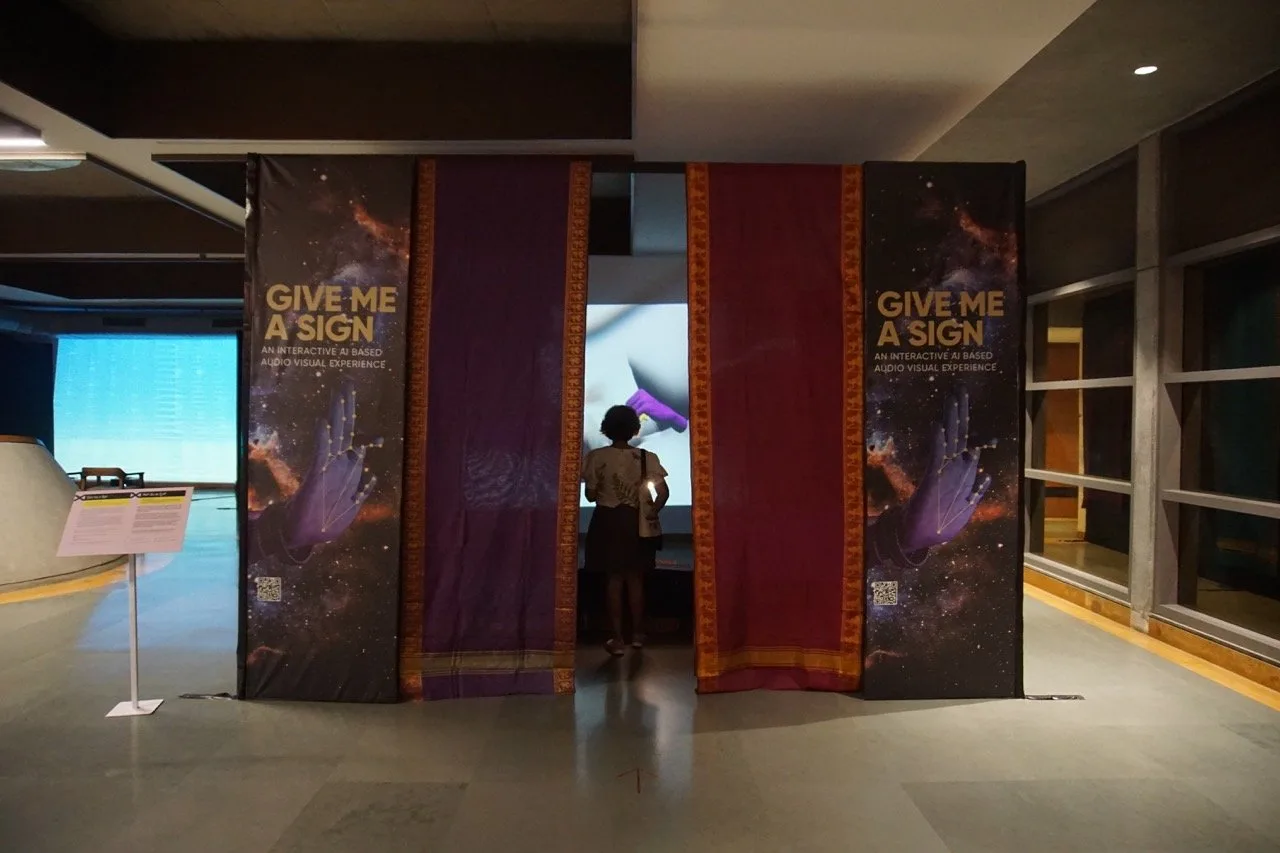 Give Me a Sign - Immersive installation entrance with thematic panels