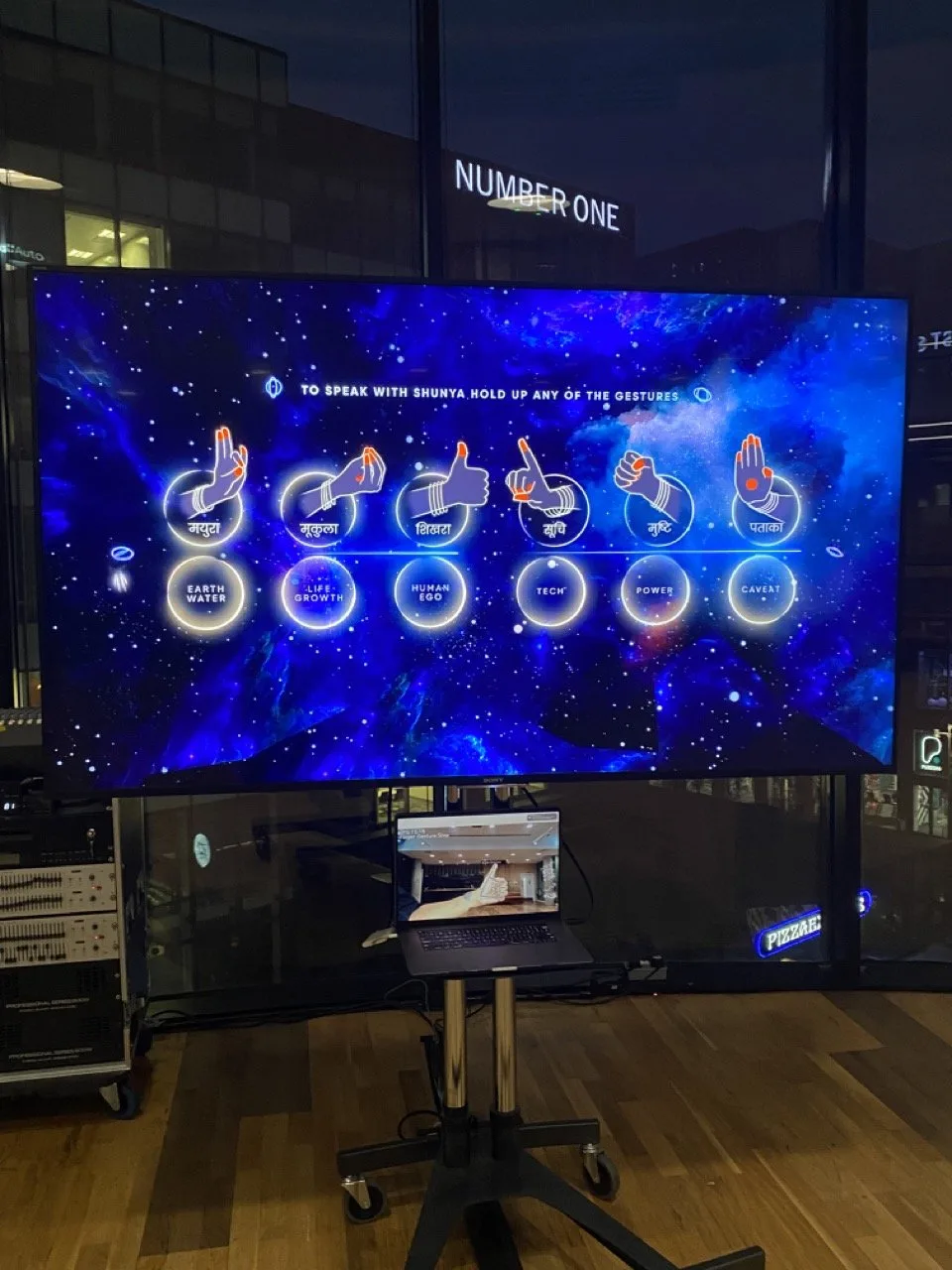 Give Me a Sign - Evening installation showing all six theme gestures interface