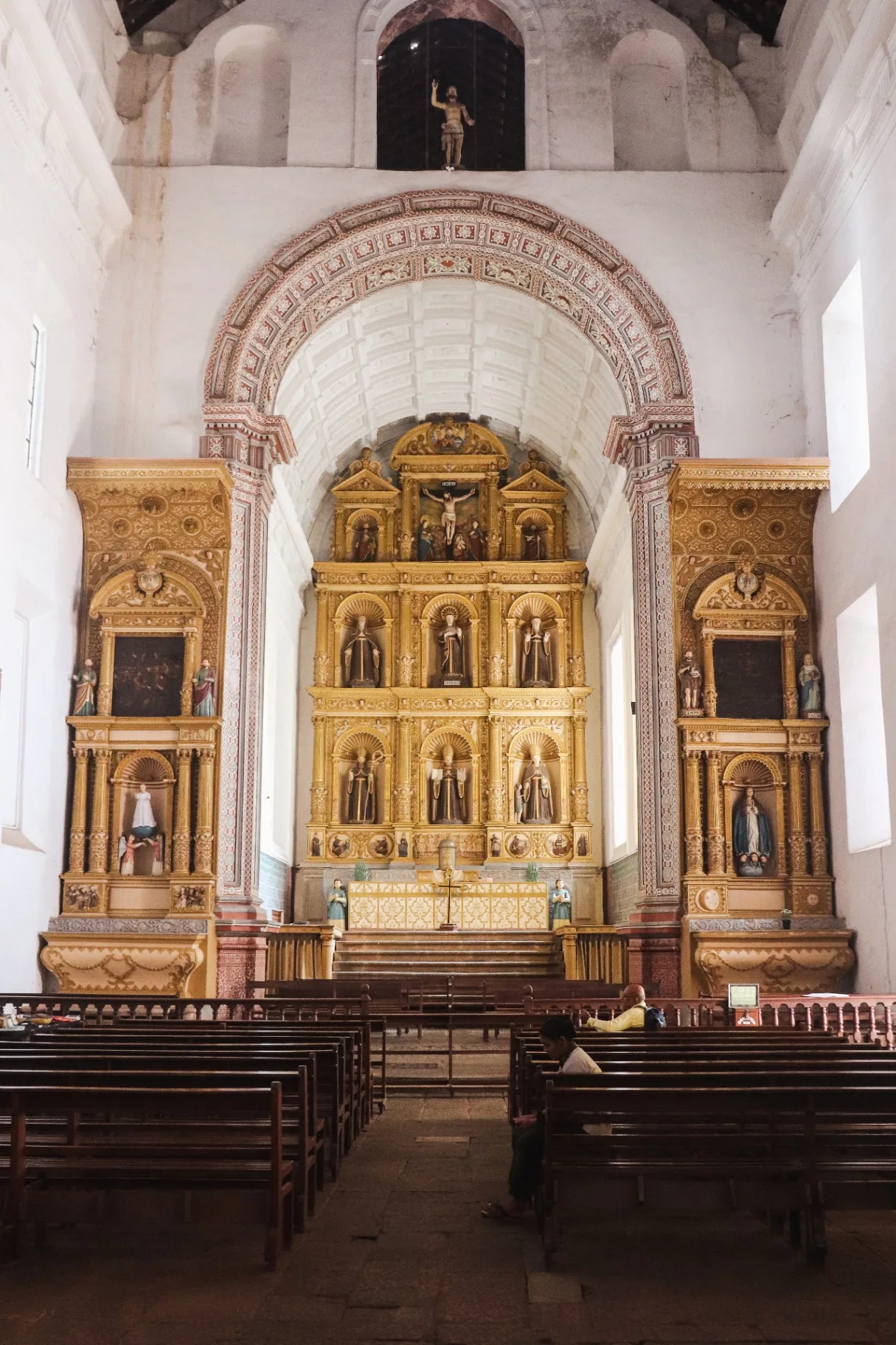 GOA FAMILIA - Church interior with ornate golden altar and Portuguese colonial architecture
