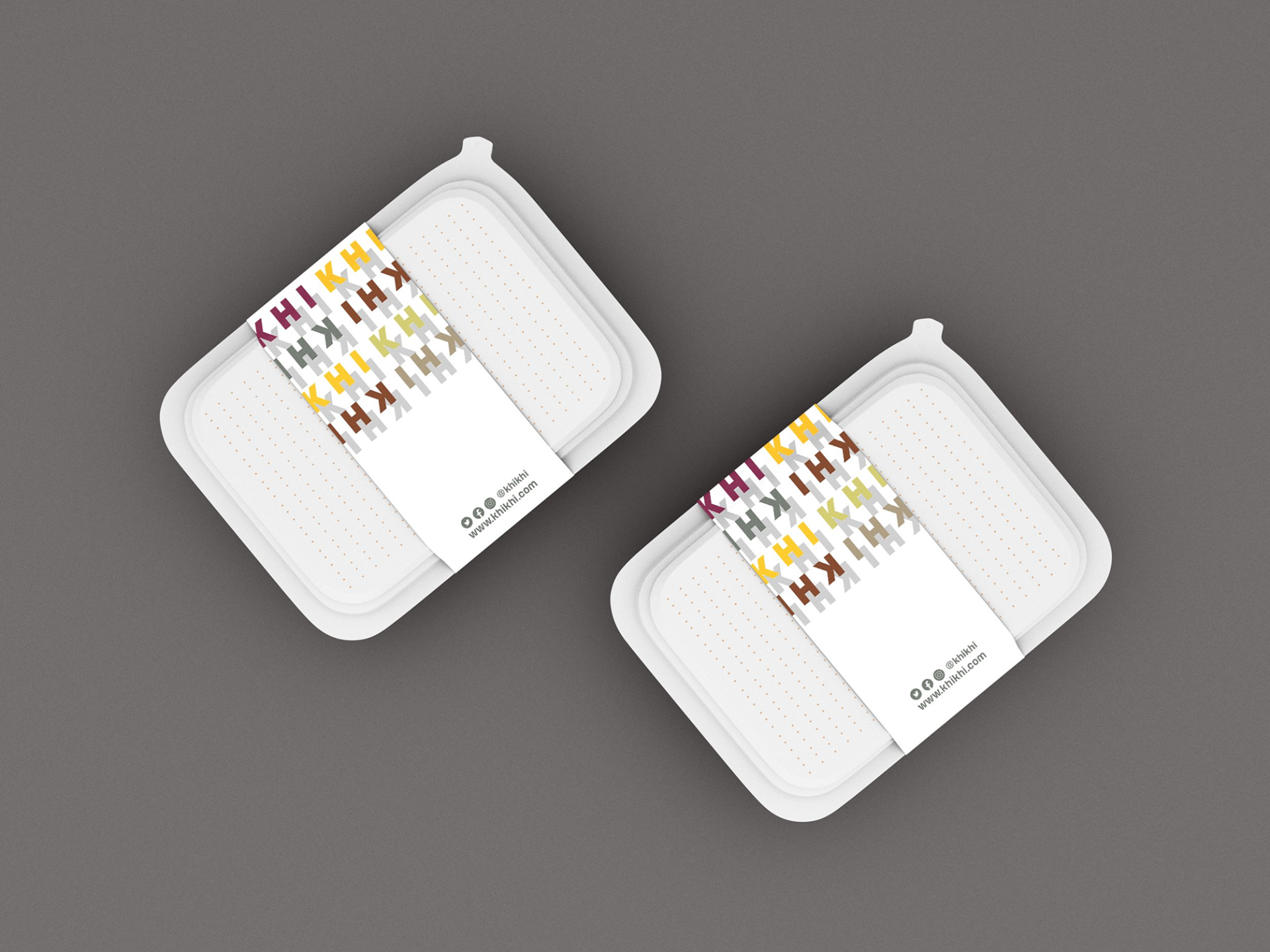 KHI KHI branded takeaway boxes with colorful logo pattern labels showcasing packaging design applications