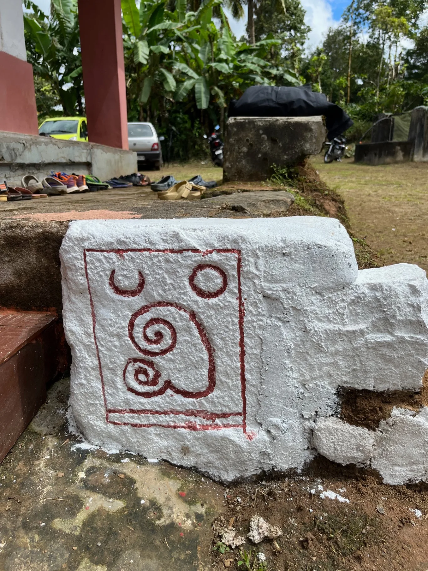 Stone carving with Kodava symbols