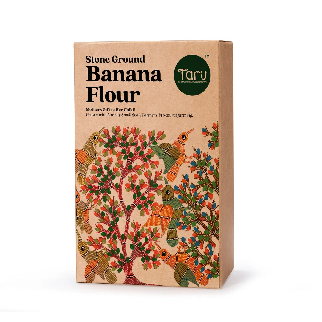 Taru Naturals - Stone Ground Banana Flour packaging featuring vibrant Gond art of peacocks and flowering trees