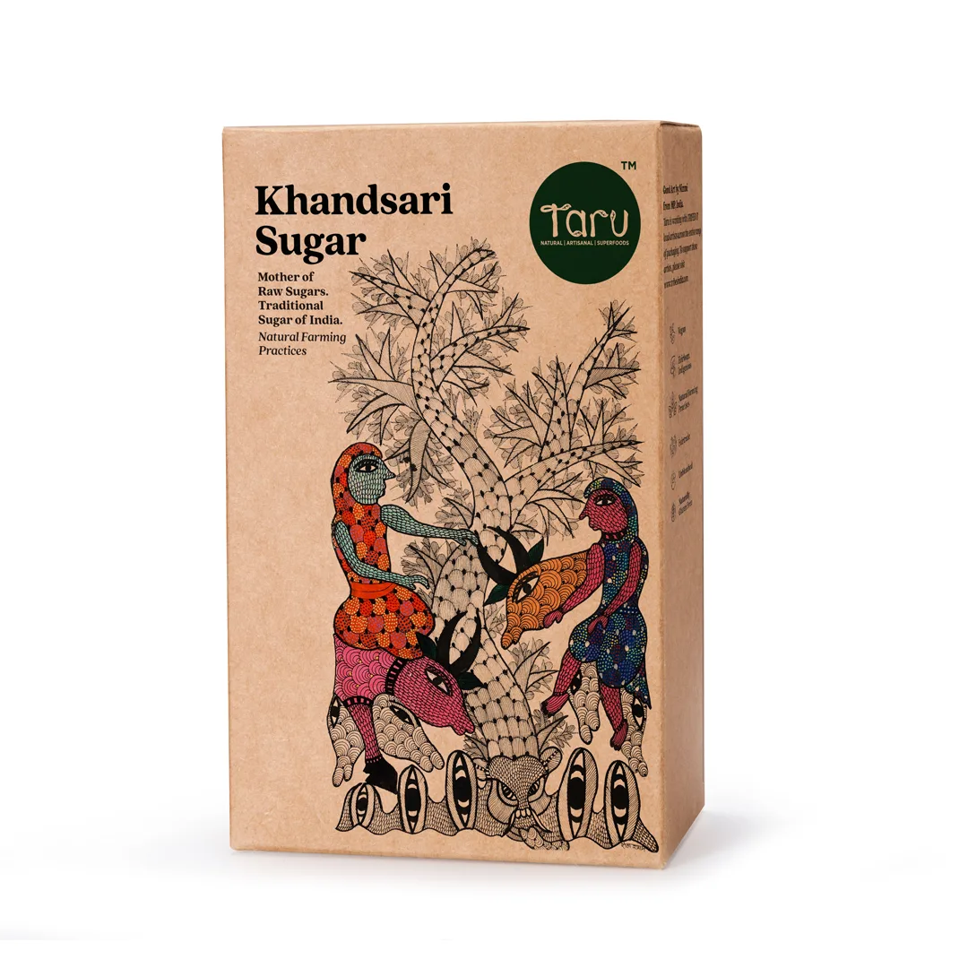 Taru Naturals - Khandsari Sugar box showcasing tribal art of sugarcane harvest with colorful farming scenes